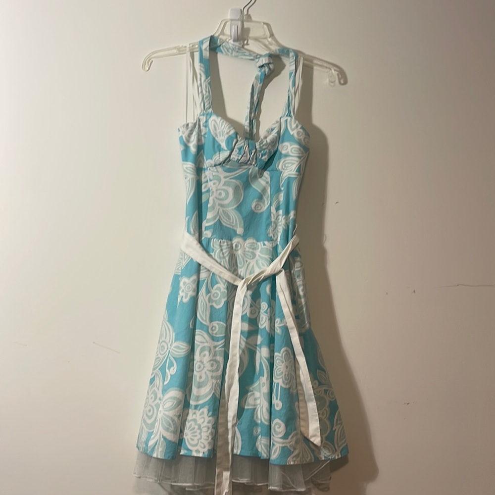Coastal themed blue teal white dress with waist tie and adjustable halter top.